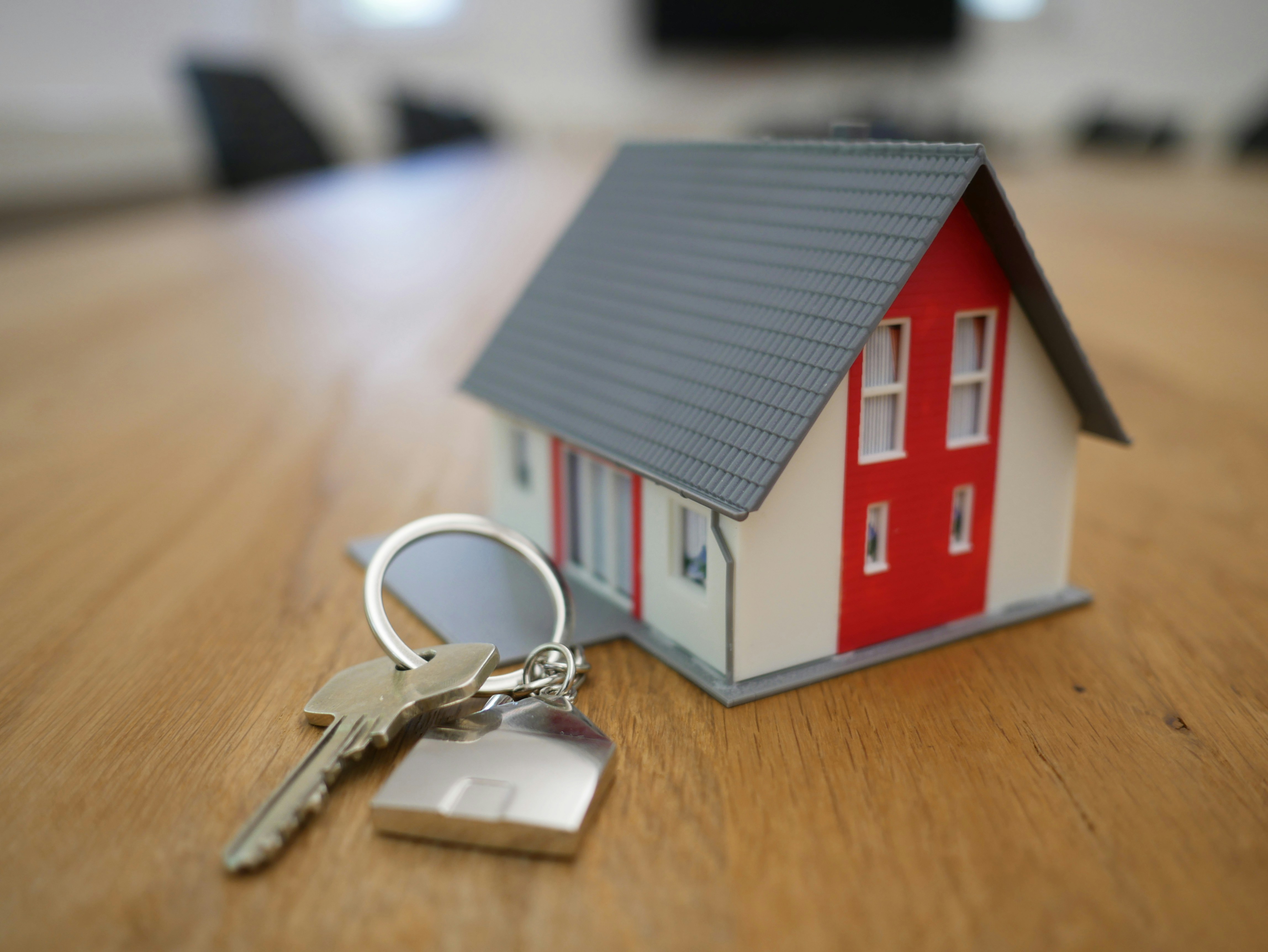 miniature home with a house key